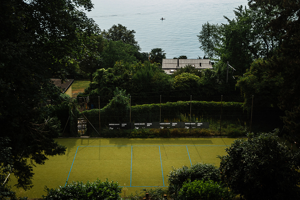 The sports court above the lake